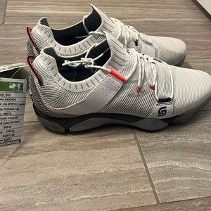 White under Armour golf shoes